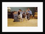 Boy Playing with the Family Dog by Anonymous