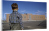 Boy Standing in Schoolyard by Anonymous