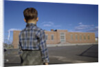 Boy Standing in Schoolyard by Anonymous