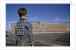 Boy Standing in Schoolyard by Anonymous