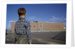 Boy Standing in Schoolyard by Anonymous