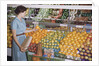 Woman Shopping at Grocery Store by Anonymous