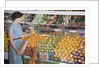 Woman Shopping at Grocery Store by Anonymous