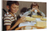 Children Drinking Milk at Dinner Table by Anonymous