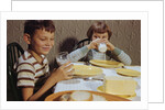 Children Drinking Milk at Dinner Table by Anonymous
