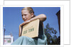 Girl Holding Town History Book by Anonymous