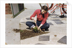 Woman Gardening by Anonymous