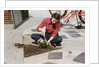 Woman Gardening by Anonymous