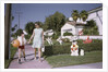 Mother and Son Walking by Christmas Decorations on Yards by Anonymous