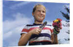 Girl Holding Cut Flowers by Anonymous