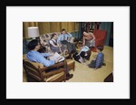 Family in Living Room with Dog by Anonymous