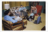 Family in Living Room with Dog by Anonymous