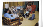 Family in Living Room with Dog by Anonymous