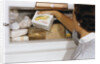 Woman Holding Box of Frozen Corn by Anonymous