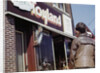 Boy Windowshopping at Toyland by Anonymous