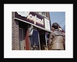 Boy Windowshopping at Toyland by Anonymous