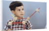 Boy Playing with Tinkertoys (TM) by Anonymous