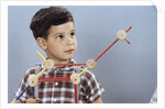 Boy Playing with Tinkertoys (TM) by Anonymous