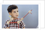 Boy Playing with Tinkertoys (TM) by Anonymous