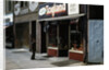 Boy Standing Outside Toyland by Anonymous