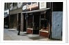 Boy Standing Outside Toyland by Anonymous