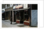 Boy Standing Outside Toyland by Anonymous
