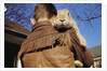 Boy Carrying Rabbit by Anonymous