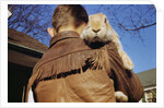 Boy Carrying Rabbit by Anonymous