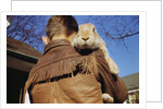 Boy Carrying Rabbit by Anonymous
