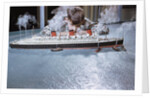 Boy Playing with Toy Ocean Liner by Anonymous