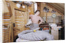 Woman Standing in an Attic by Anonymous
