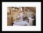 Woman Standing in an Attic by Anonymous