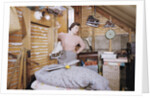 Woman Standing in an Attic by Anonymous