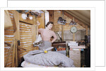 Woman Standing in an Attic by Anonymous