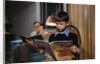 Father and Son Reading at Home by Anonymous