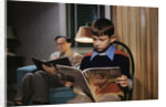 Father and Son Reading at Home by Anonymous