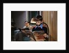 Father and Son Reading at Home by Anonymous