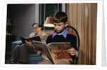 Father and Son Reading at Home by Anonymous