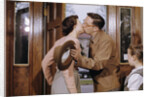Husband and Wife Kissing Goodbye by Anonymous