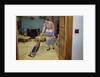 Woman Vacuuming Living Room by Anonymous