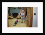 Woman Vacuuming Living Room by Anonymous