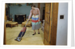 Woman Vacuuming Living Room by Anonymous