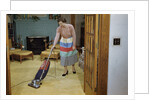 Woman Vacuuming Living Room by Anonymous