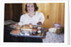 Girl Carrying Tray of Barbecue Items by Anonymous