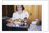 Girl Carrying Tray of Barbecue Items by Anonymous
