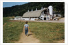 Boy Walking Towards a Barn by Anonymous