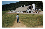 Boy Walking Towards a Barn by Anonymous