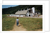 Boy Walking Towards a Barn by Anonymous