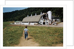 Boy Walking Towards a Barn by Anonymous