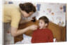 Mother Giving Her Son Medicine by Anonymous
